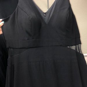 Formal black dress with mesh side panels